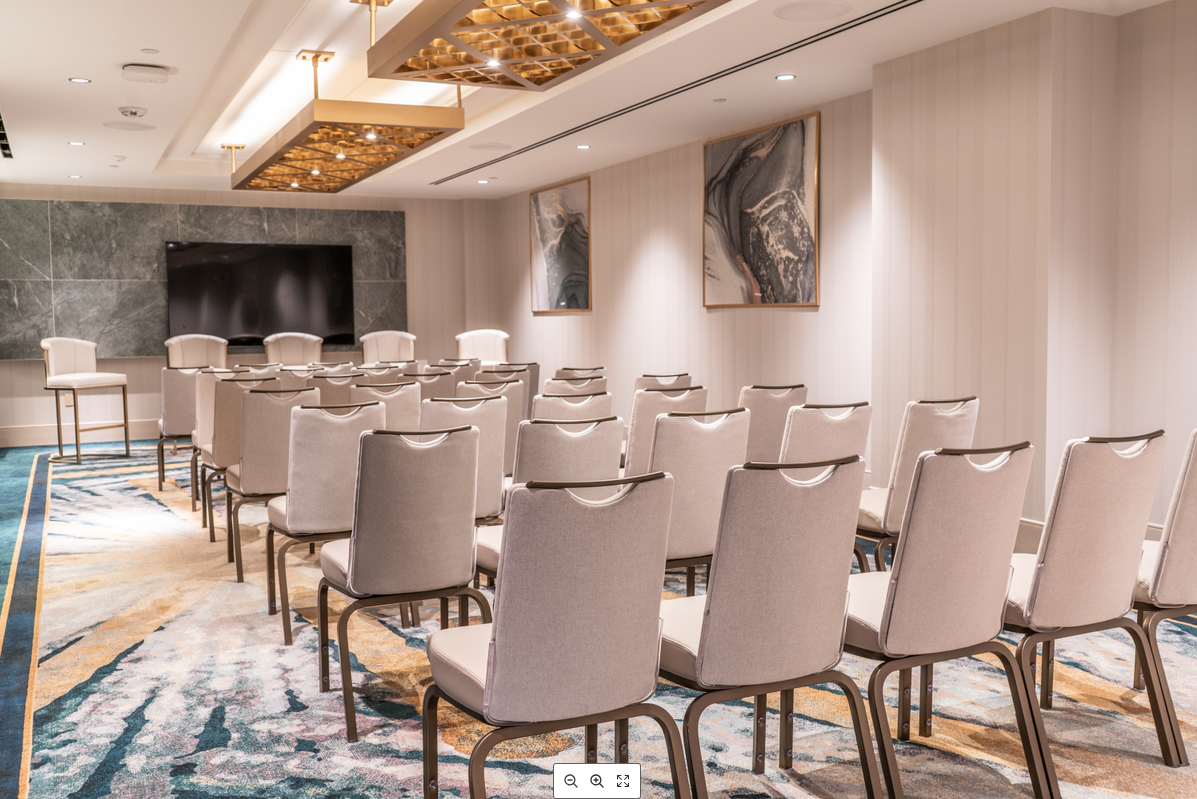 theater setting meeting room wtih rows of chairs